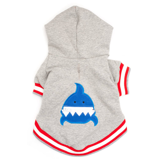 Grey pet hoodie with a blue shark graphic on the back, featuring a zippered mouth and red and white stripes