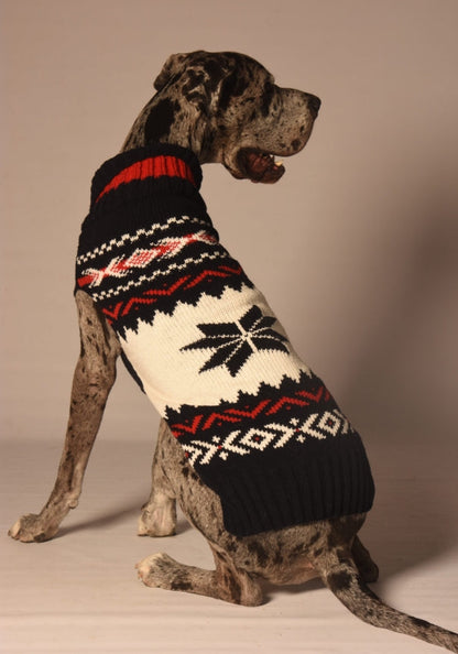 Great Dane wearing a black, white, and red Fair Isle patterned dog sweater