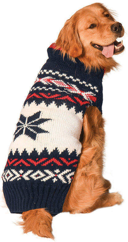 Golden retriever wearing a navy, white, and red Fair Isle patterned dog sweater